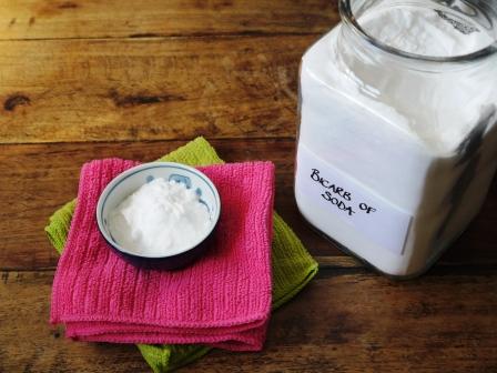 Bicarb of Soda (Baking Soda ) in a jar with the lid on a pile of clothes