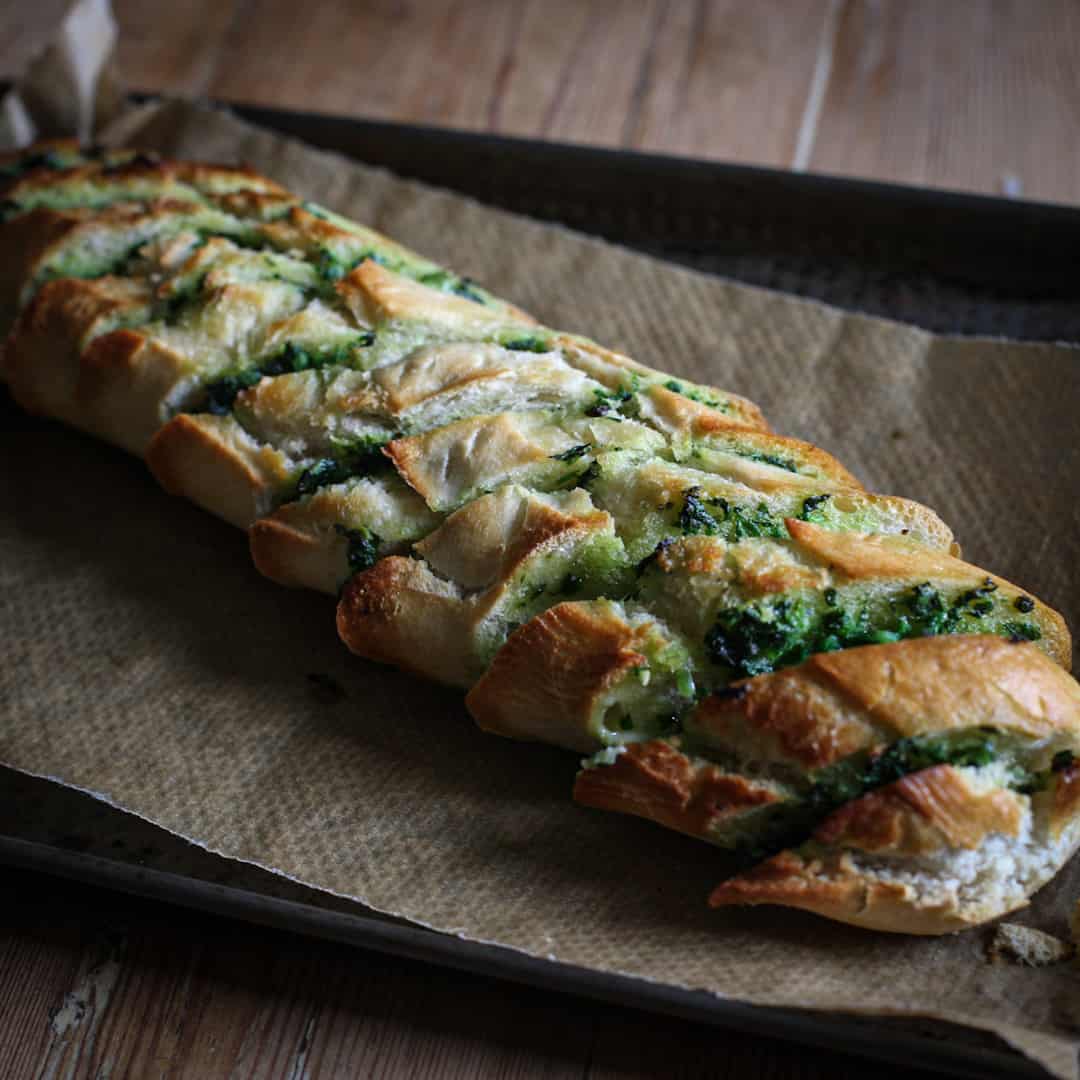 Golden brown wild garlic butter baguette