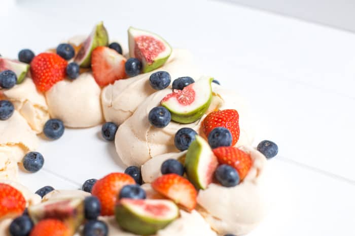 Meringue Wreath with fresh berries and figs