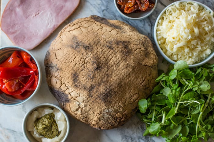 Pressed Picnic Sandwich ingredients on a table top