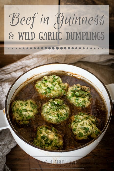 casserole dish containing beef in guinness with wild garlic mushrooms on a wooden table with a white cloth