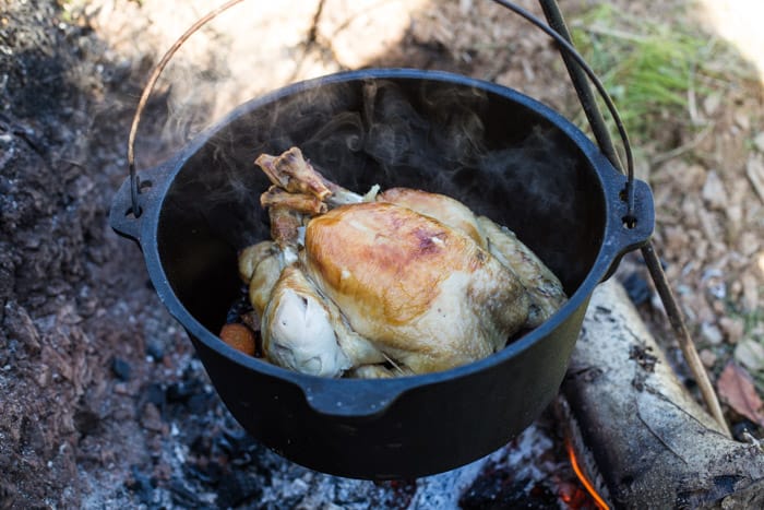 Dutch Oven Roast Chicken over a camp fire