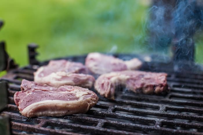 BBQ Lamb Chops with Minted Mayo Lamb chops cooking on the BBQ