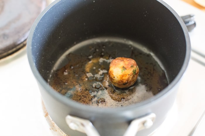 Crispy fish Ball shallow frying in a saucepan