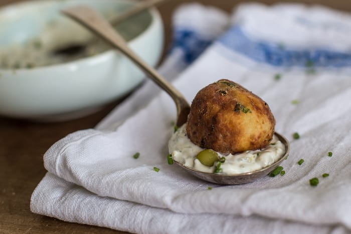 Crispy Fish Balls with Easy Tartare Sauce served on a teaspoon on a white cloth