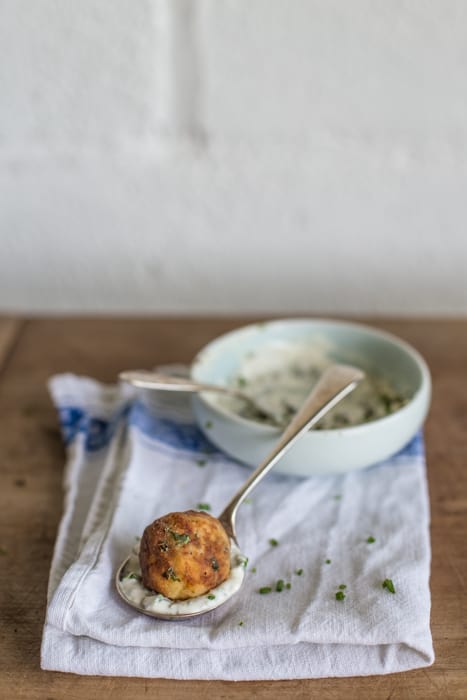 Crispy Fish Balls with Easy Tartare Sauce served on a teaspoon on a white cloth