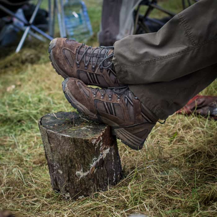 feet up on a tree stump 