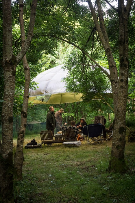 Eating Spicy n'duja meatballs under a parachute in the woods