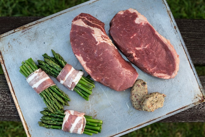 Festive Dirty Steak Salad ingredients on a plate ready to cook