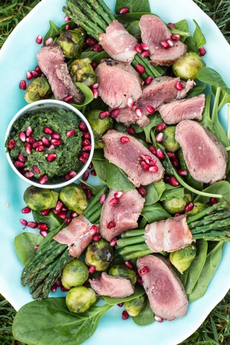 Festive Dirty Steak Salad on a white plate