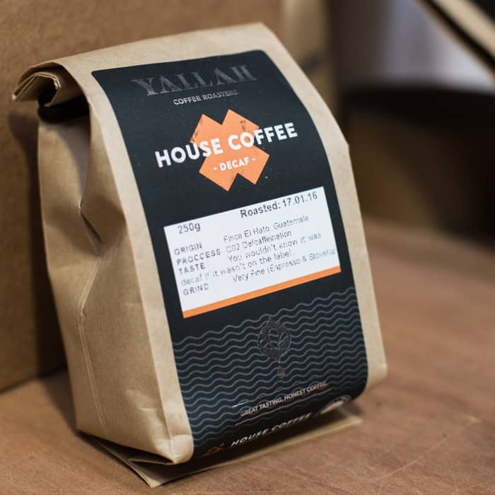 Yallah House Coffee in a brown paper packet