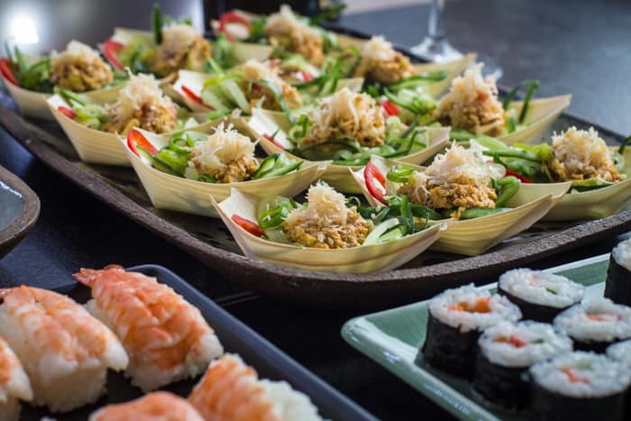 Serving tray with bite size portions of Asian crab and lemongrass salad