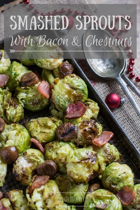 Smashed Sprouts with Bacon and Chestnuts in a roasting tin with a seving spoon beside them