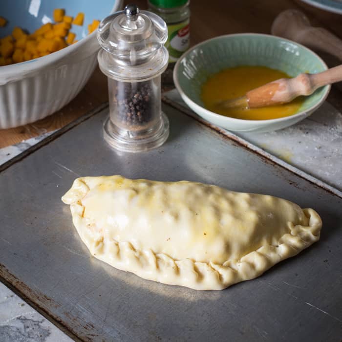 A homemade butternut and sage pasty ready to be baked