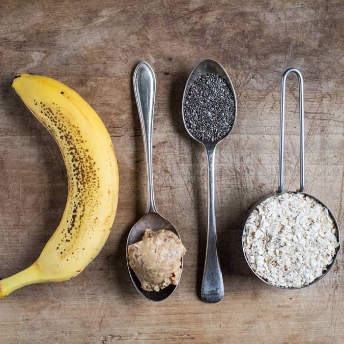 ingredients for overnight oats on a wooden table