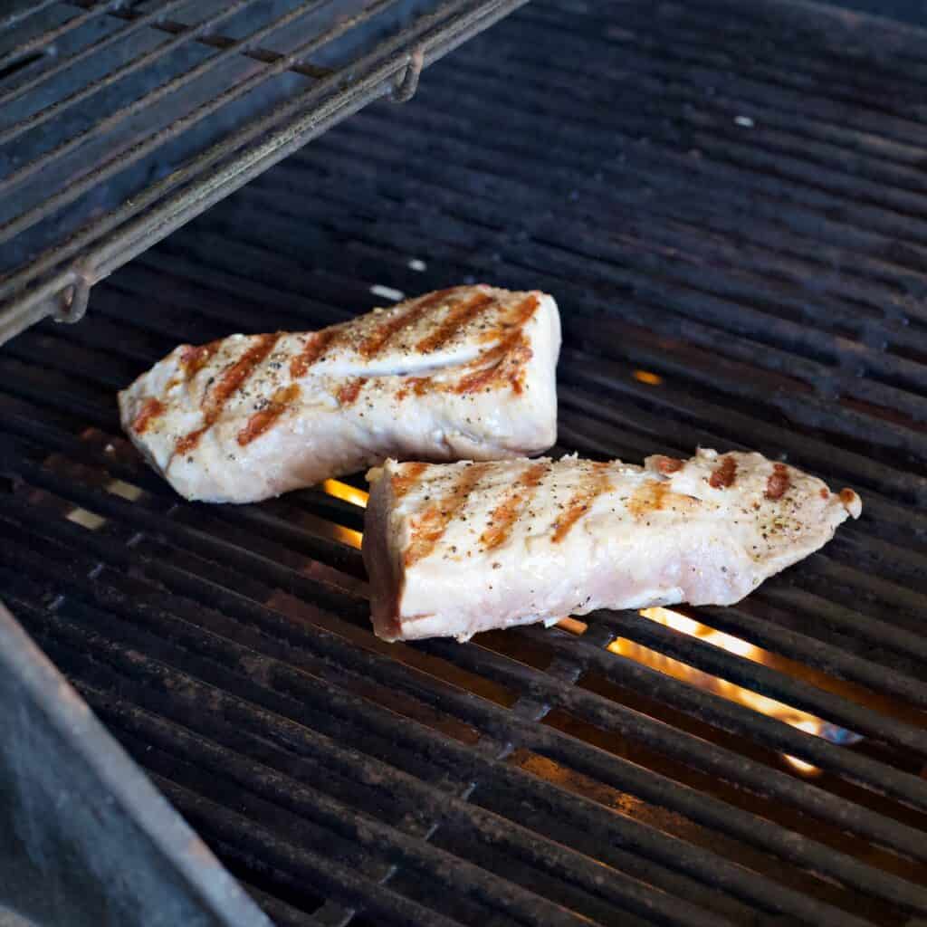 A pork fillet cooking of a gas BBQ