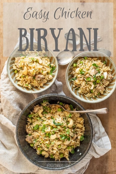 wooden board with 3 bowls filled with my easy chicken biryani recipe