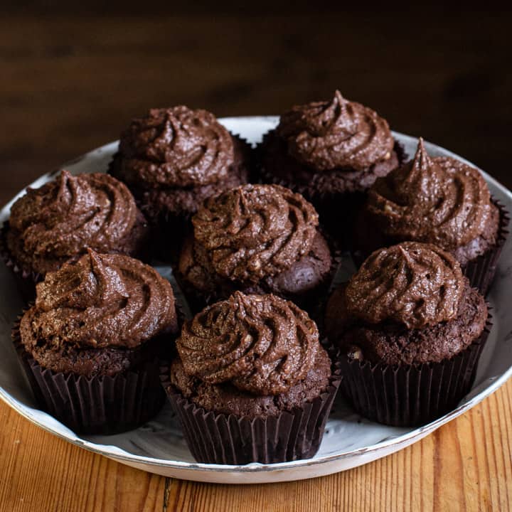 white plate of chocolate muffins