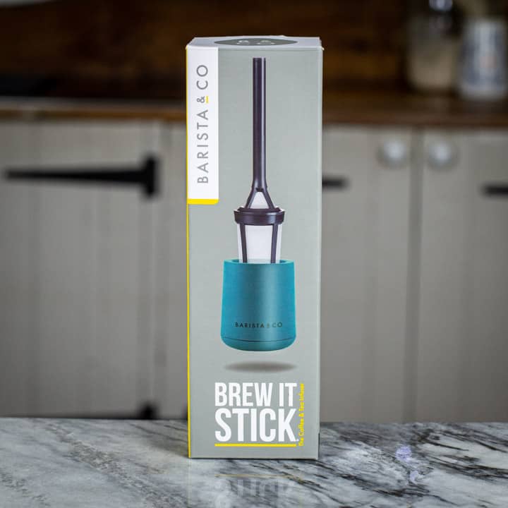 Brew It Stick camping coffee maker box on marble surface