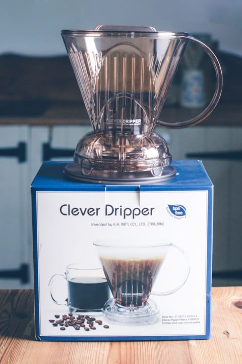 clever dripper coffee maker stood on its box on a wooden kitchen counter