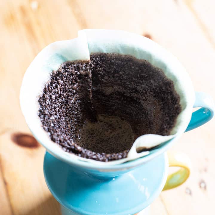 inside of a paper coffee filter as the coffee drains through