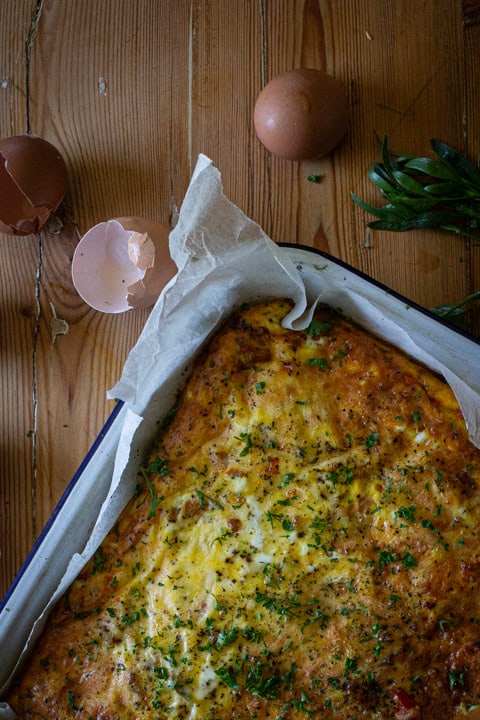 fresh baked frittata sprinkled with fresh parsely