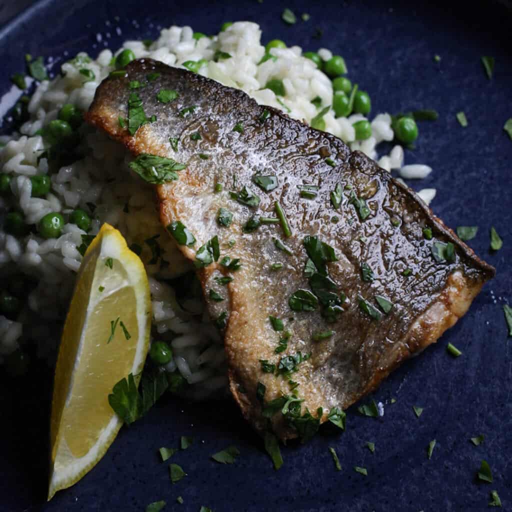 Quick Crispy Sea Bass Risotto with Peas and Lemon The